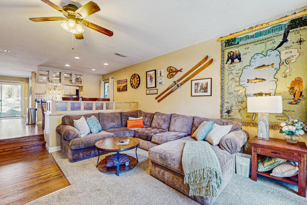 a living room with a couch and a table at The Tahoe Nest in Incline Village