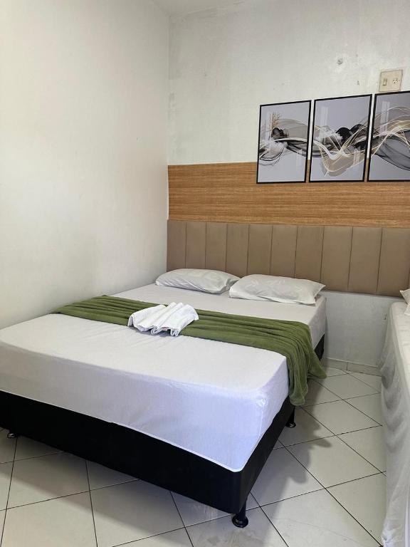 Postel nebo postele na pokoji v ubytování Lua Hotel