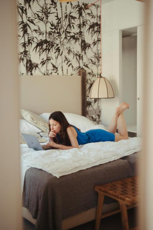 Ein Bett oder Betten in einem Zimmer der Unterkunft Hotel Honucai