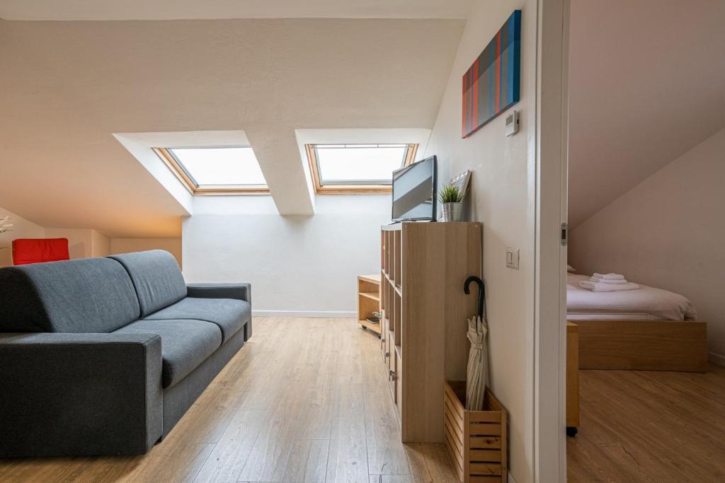 Televízia a/alebo spoločenská miestnosť v ubytovaní Como City Center Apartments!