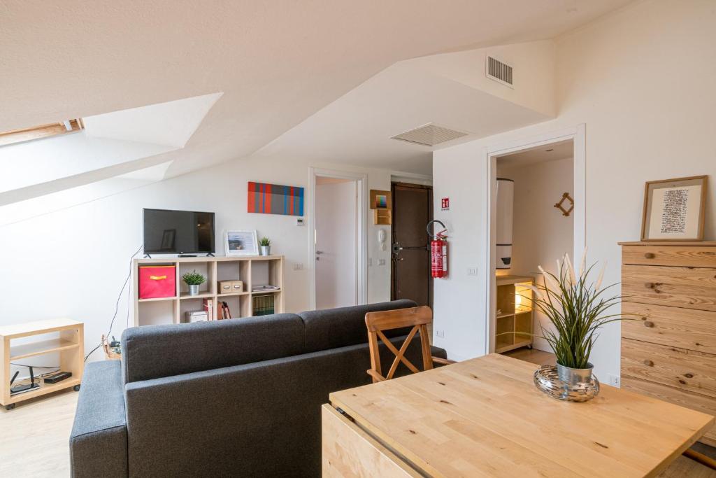 Televízia a/alebo spoločenská miestnosť v ubytovaní Como City Center Apartments!