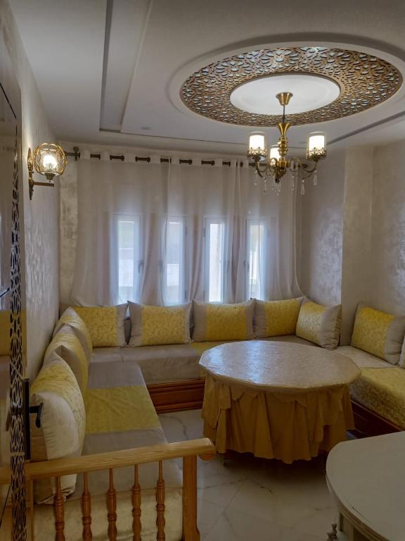 Posezení v ubytování appartement équipé 2e étage