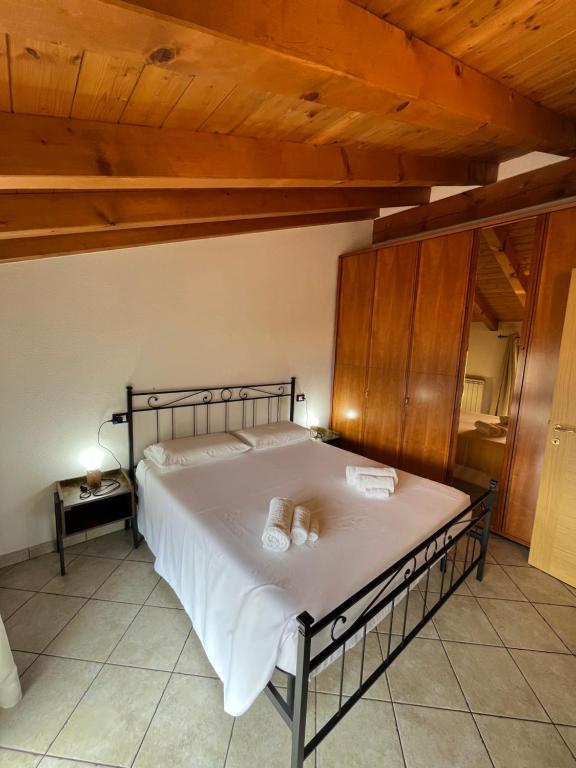Postel nebo postele na pokoji v ubytování B&B Garzola