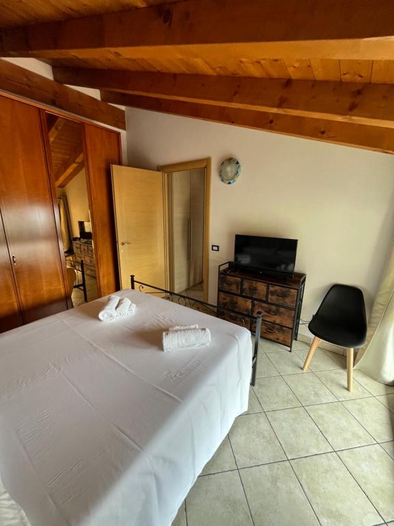 Postel nebo postele na pokoji v ubytování B&B Garzola
