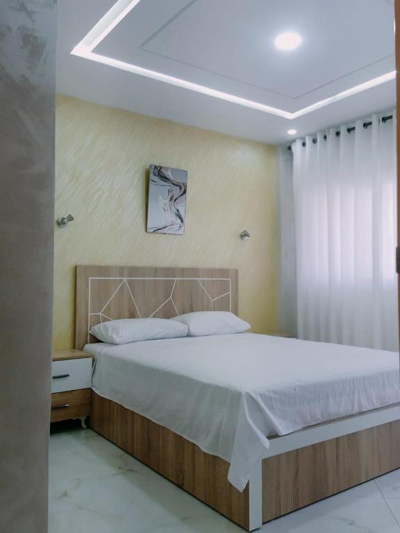 Postel nebo postele na pokoji v ubytování appartement équipé 2e étage