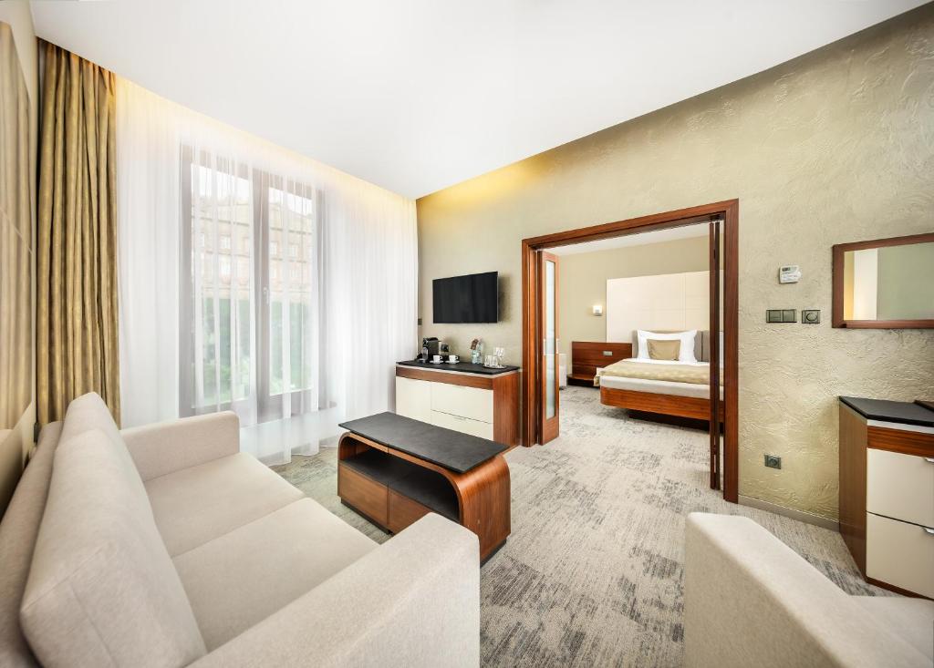 TV a/nebo společenská místnost v ubytování Wellness Hotel Diamant