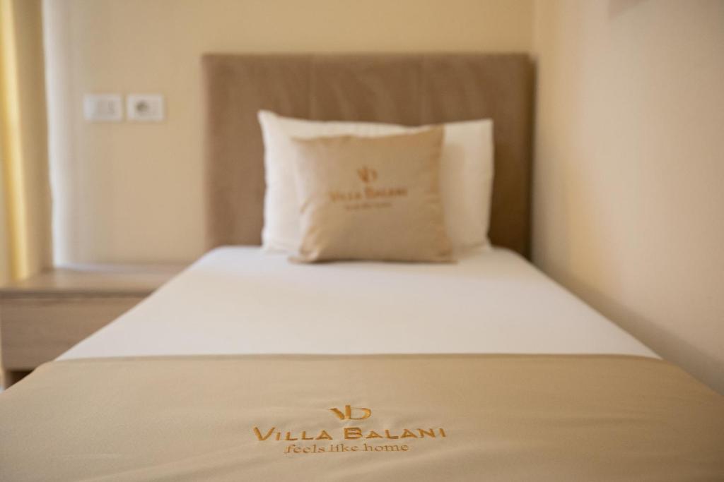 Postel nebo postele na pokoji v ubytování Villa Balani