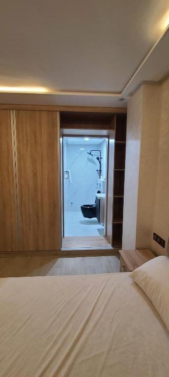 Postel nebo postele na pokoji v ubytování appartment igar azougagh elhoceima