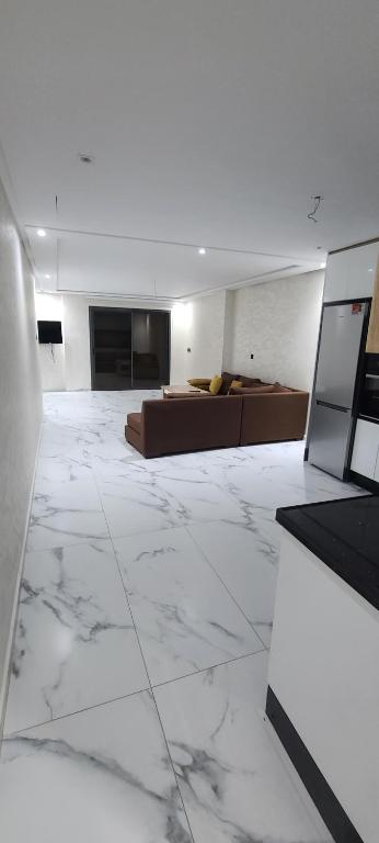 TV a/nebo společenská místnost v ubytování appartment igar azougagh elhoceima
