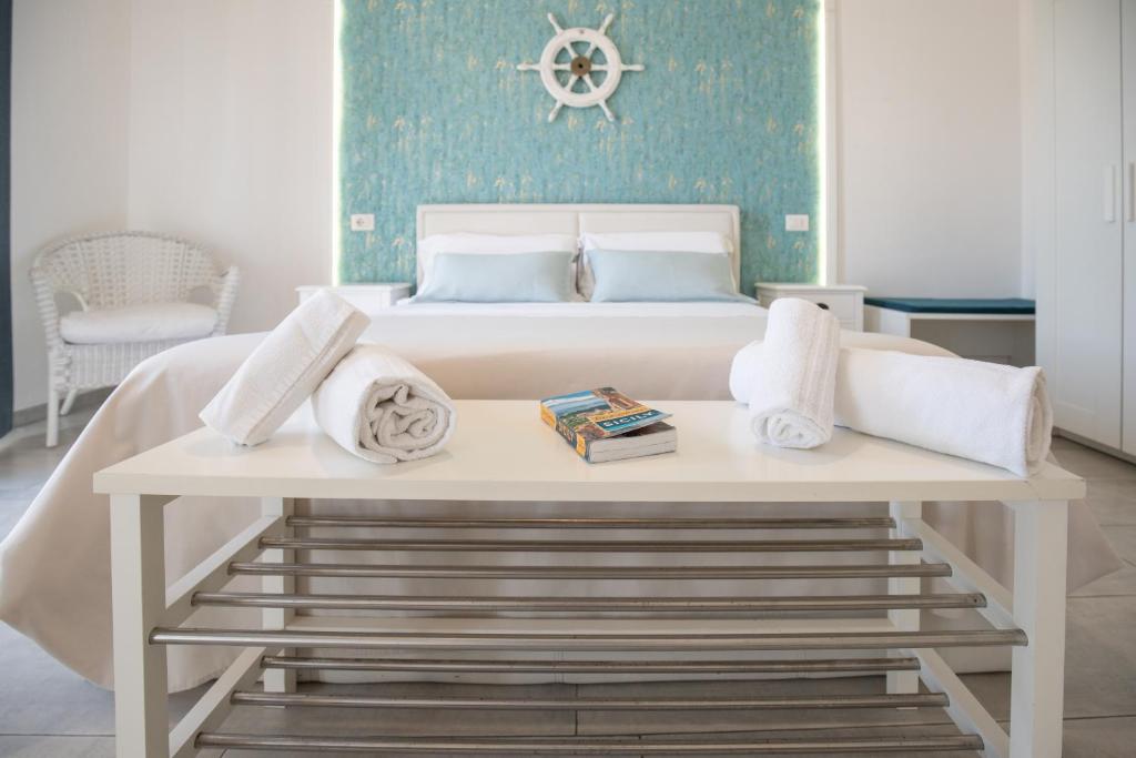 Кровать или кровати в номере Catania Over Time - Tourist Rooms