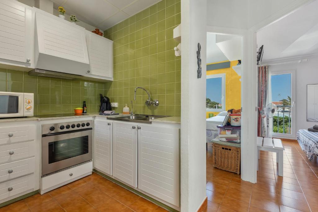Kuchyň nebo kuchyňský kout v ubytování Apartamento Rose