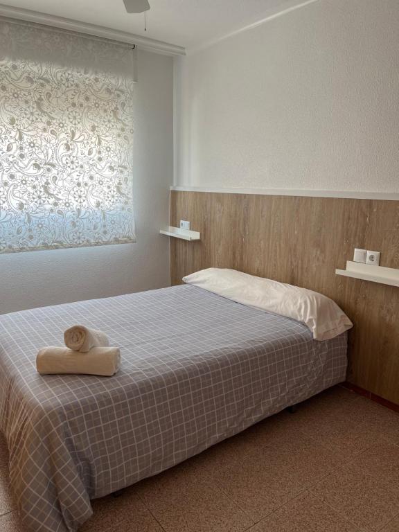 Postel nebo postele na pokoji v ubytování Apartamento CA VALEN 2