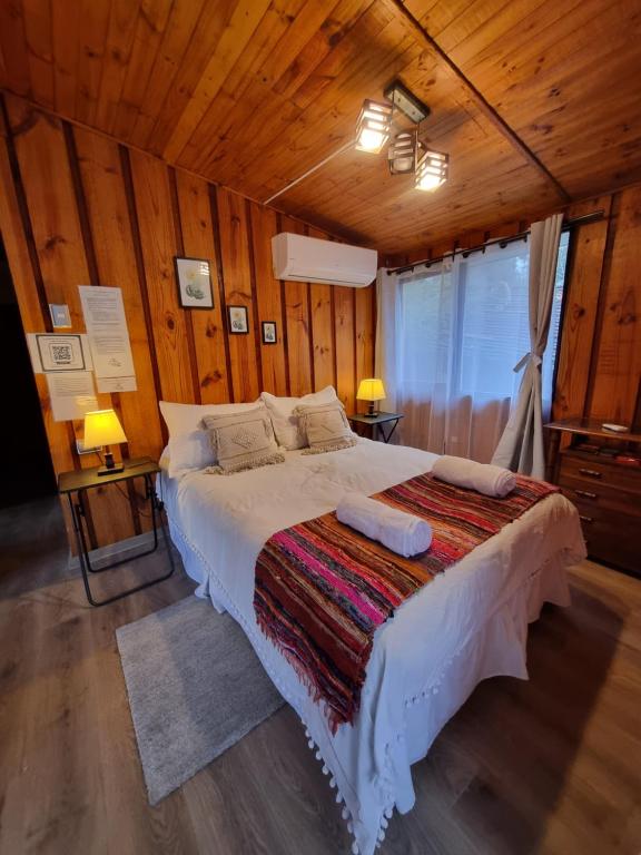 Postel nebo postele na pokoji v ubytování Cabañas Carolín Cacao Castaño