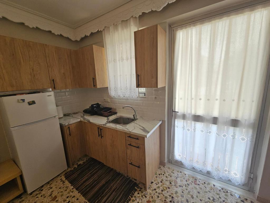 Kuchyň nebo kuchyňský kout v ubytování Cleo's Home