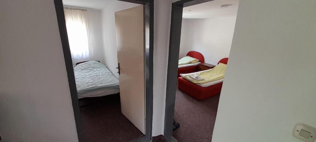 Krevet ili kreveti u jedinici u okviru objekta Mahala Apartments - Free Garage