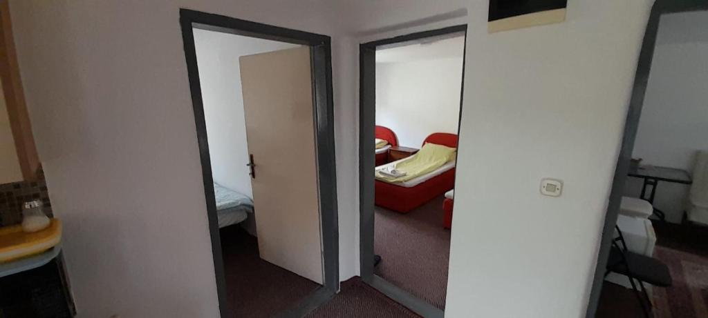 Krevet ili kreveti u jedinici u okviru objekta Mahala Apartments - Free Garage
