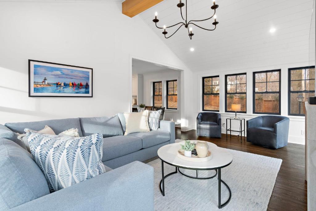 a living room with a couch and a table at Wayzata Cove in Wayzata
