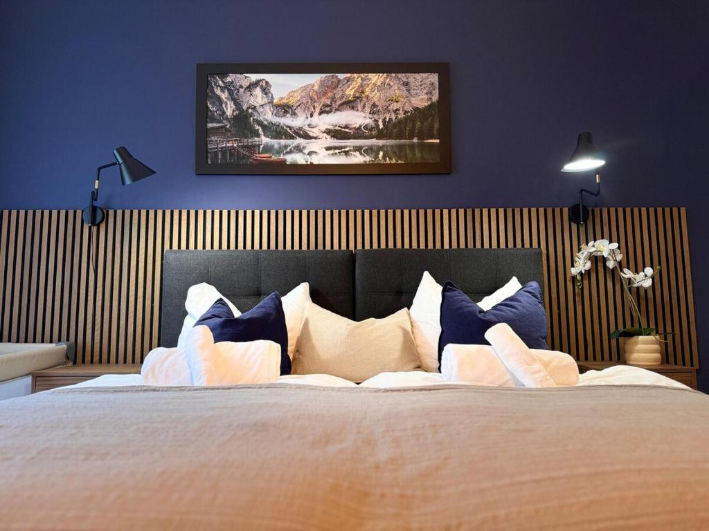 Ένα ή περισσότερα κρεβάτια σε δωμάτιο στο Zentrale Wohnung direkt am Hauptbahnhof - Bismarck