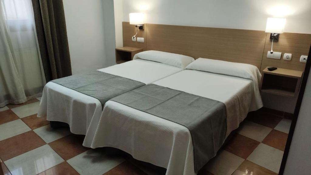 Postel nebo postele na pokoji v ubytování Don Paula