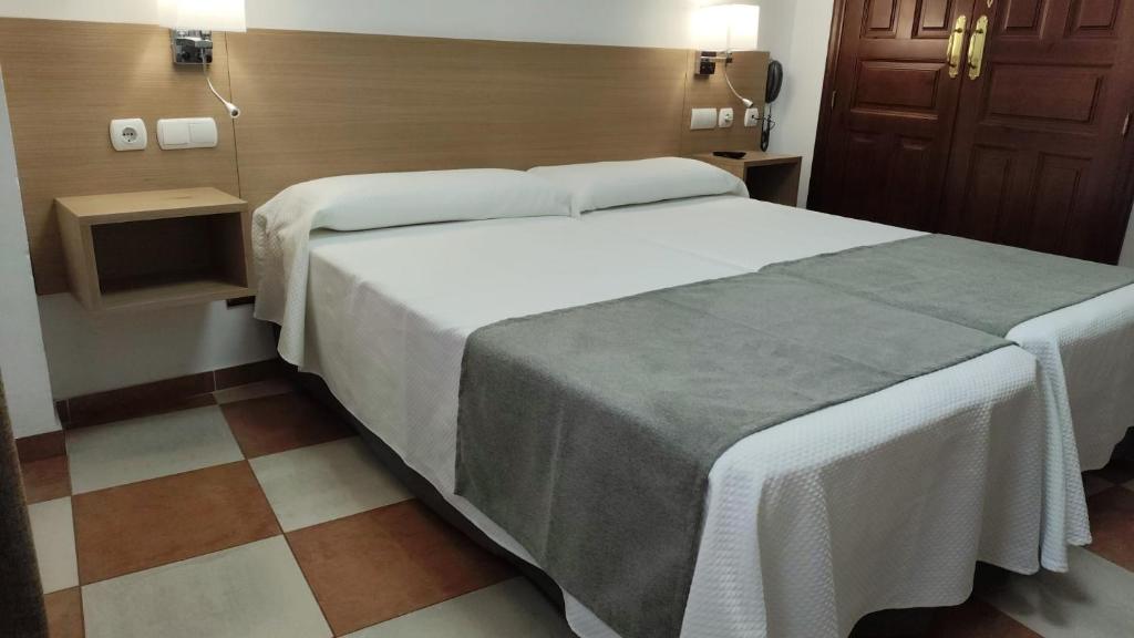 Postel nebo postele na pokoji v ubytování Don Paula