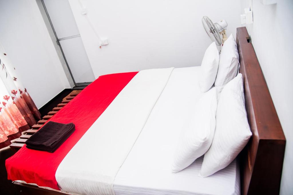 Postel nebo postele na pokoji v ubytování Minthu Homestay