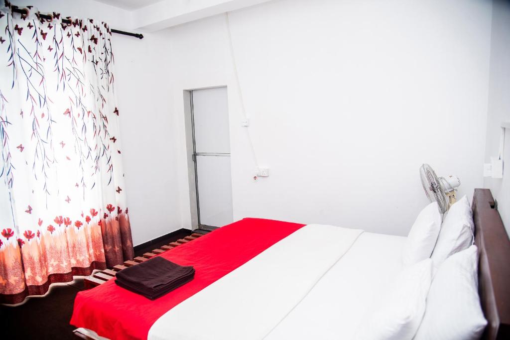 Postel nebo postele na pokoji v ubytování Minthu Homestay