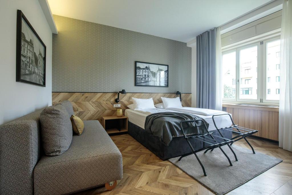 Postelja oz. postelje v sobi nastanitve Urban Boutique Hotel Center