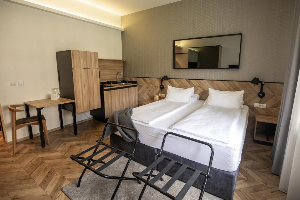 Postelja oz. postelje v sobi nastanitve Urban Boutique Hotel Center
