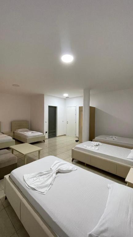 Postel nebo postele na pokoji v ubytování Hotel Skura