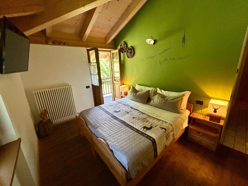 Postel nebo postele na pokoji v ubytování Agriturismo ValFraja