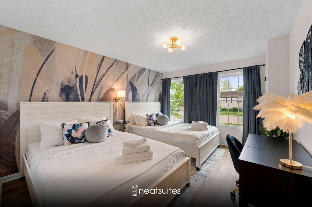 Postel nebo postele na pokoji v ubytování 2 BR 1 & half Bath Retreat, Sleeps 7, only 3 Miles to Ark!