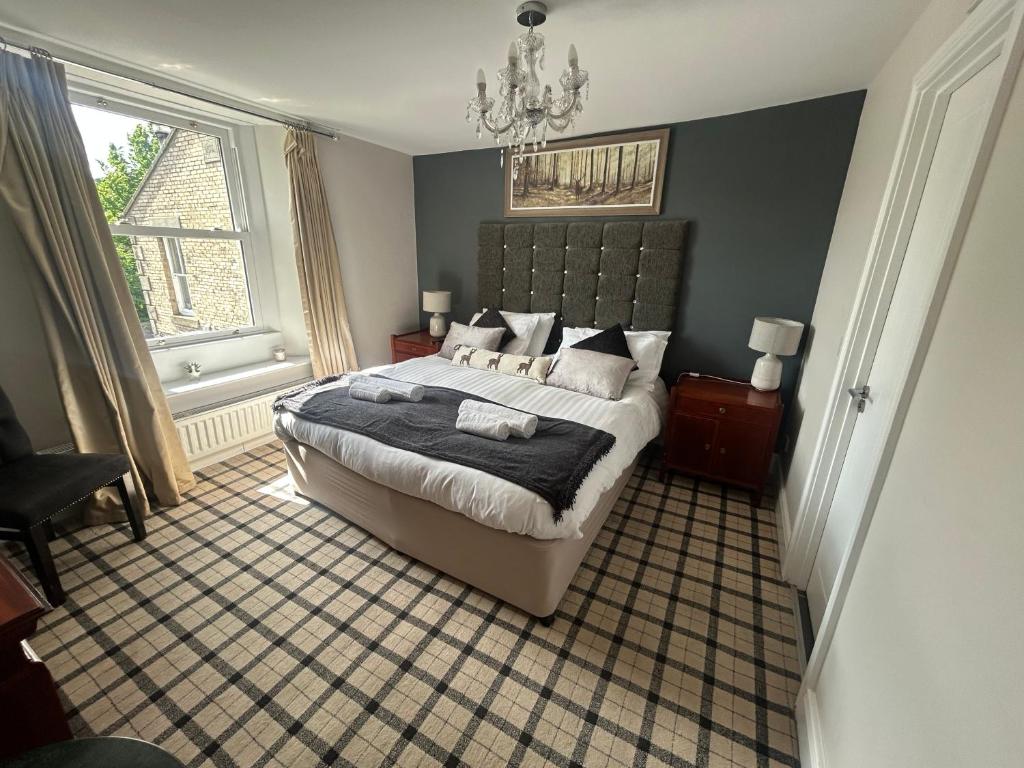 Ένα ή περισσότερα κρεβάτια σε δωμάτιο στο Ratcliffe Room