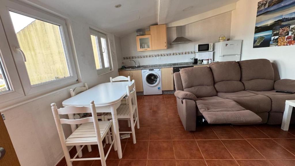 A kitchen or kitchenette at Apartamentos San Guillermo