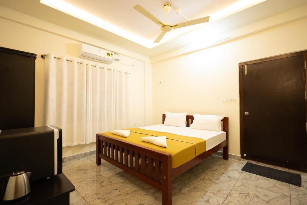 Voodi või voodid majutusasutuse Golden Crest Residences toas