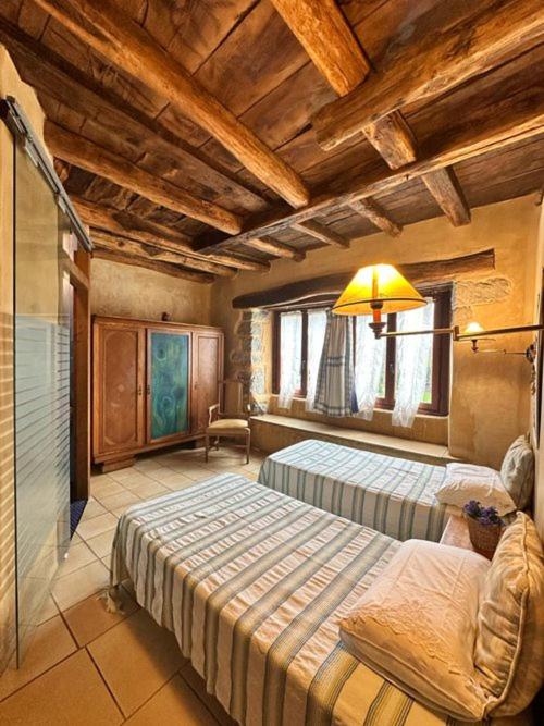 Postel nebo postele na pokoji v ubytování Casa Rural Ecológica Kaaño Etxea