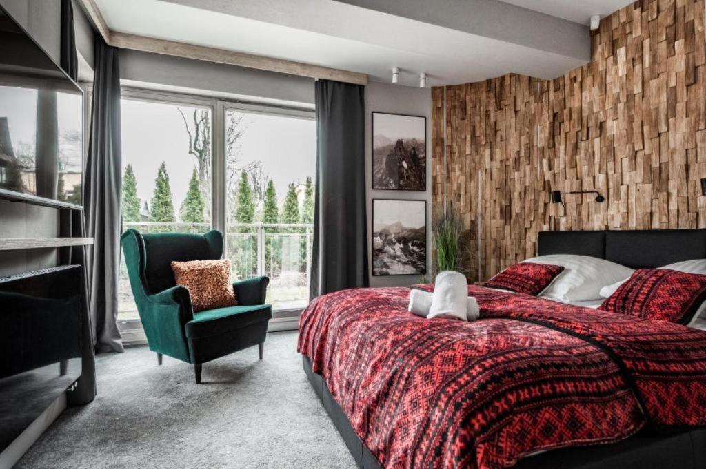 Posteľ alebo postele v izbe v ubytovaní Prestige Apartamenty Stara Polana & SPA2