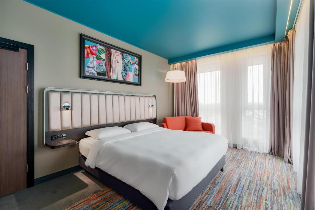 Postel nebo postele na pokoji v ubytování Park Inn by Radisson Riga Valdemara
