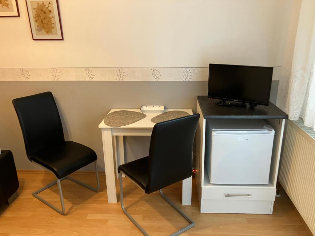 Kuchyň nebo kuchyňský kout v ubytování Ferienzimmer LANG