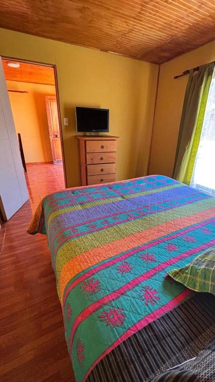 Postel nebo postele na pokoji v ubytování Entre Álamos Ltda
