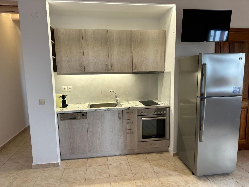 Kuchyňa alebo kuchynka v ubytovaní Andros Escape Condos