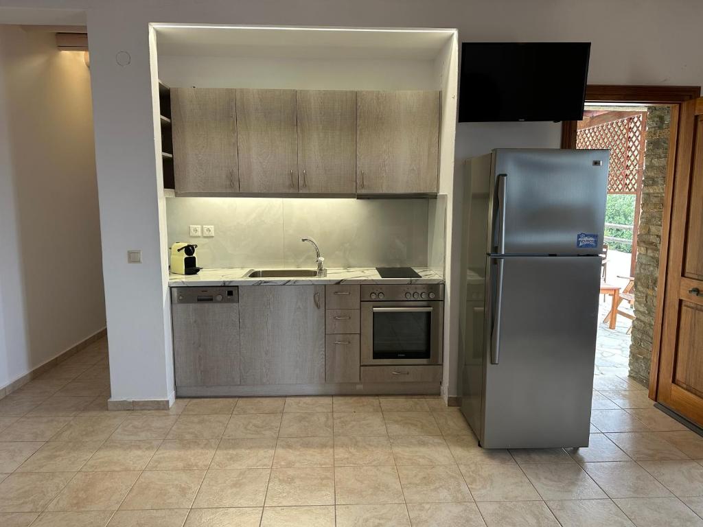 Kuchyňa alebo kuchynka v ubytovaní Andros Escape Condos