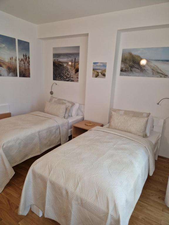 Postel nebo postele na pokoji v ubytování Room 211 - Aparthotel Jadranka