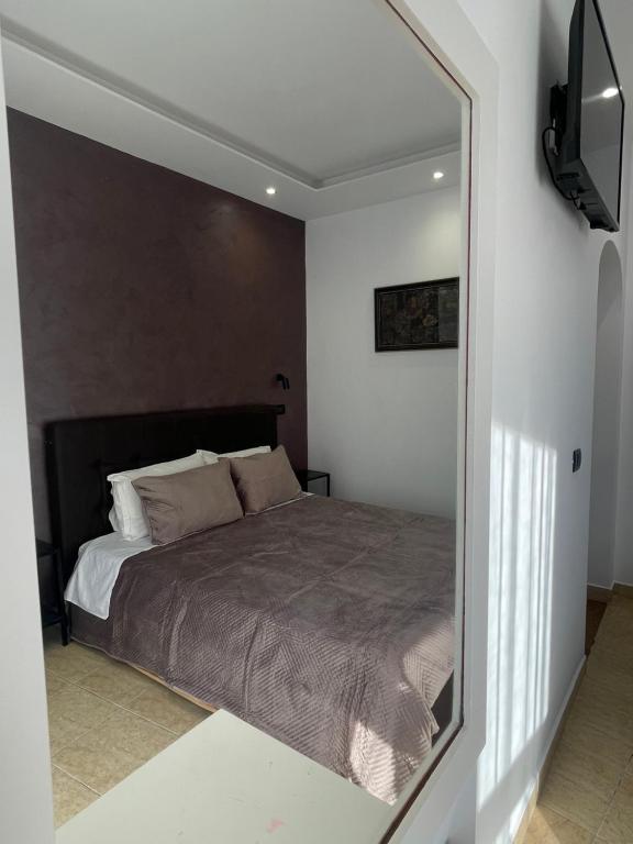 Postel nebo postele na pokoji v ubytování Hotel Riviera