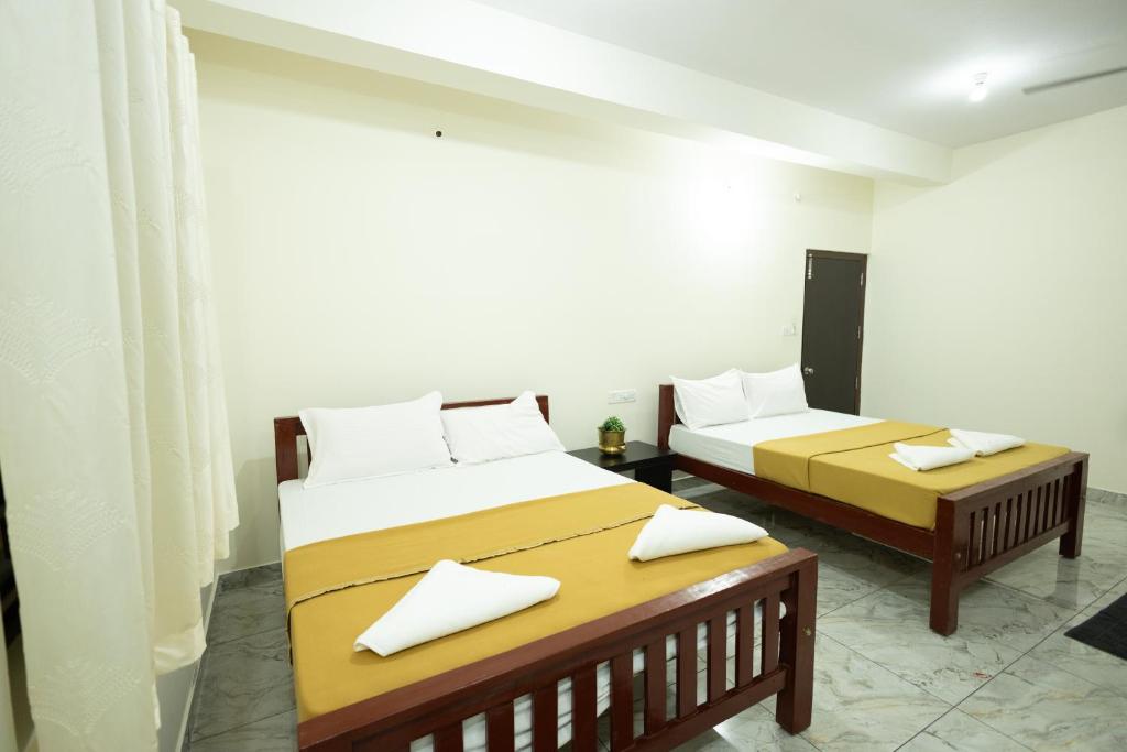 Voodi või voodid majutusasutuse Golden Crest Residences toas