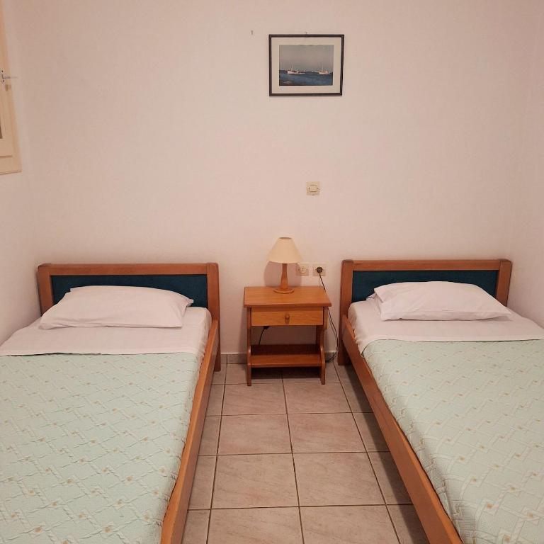 Postel nebo postele na pokoji v ubytování Athos Studios