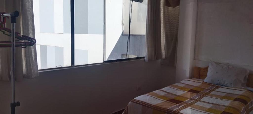 Postel nebo postele na pokoji v ubytování Kaboka Cusco Hospedaje Familiar