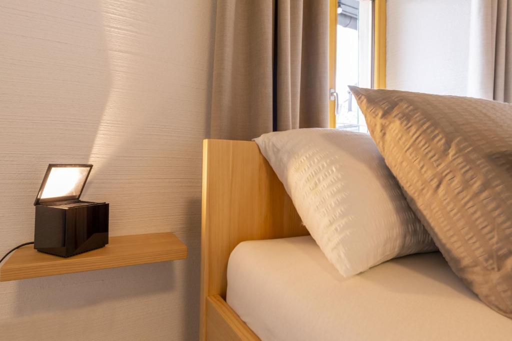 Postel nebo postele na pokoji v ubytování Apartments Bären