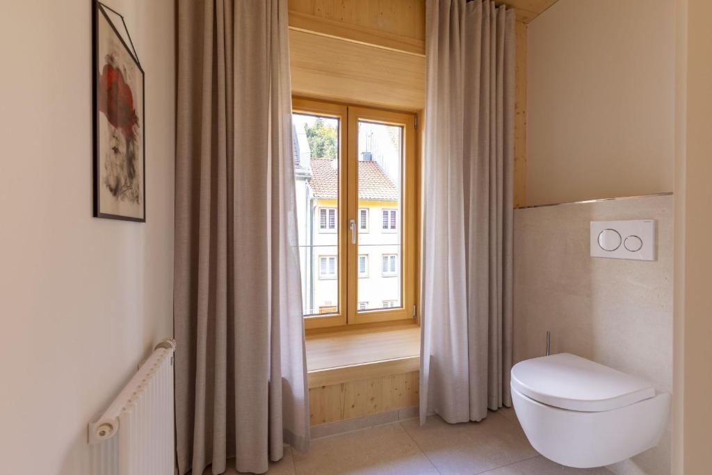 Koupelna v ubytování Apartments Bären