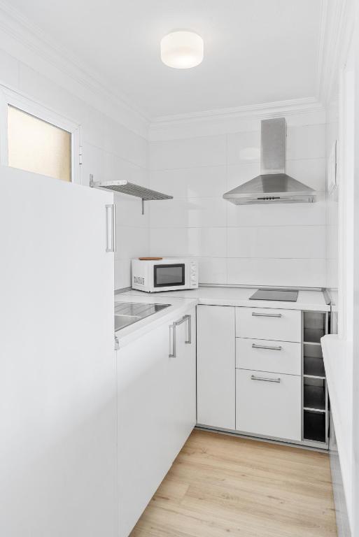 Kuchyň nebo kuchyňský kout v ubytování Apartamentos Bruja