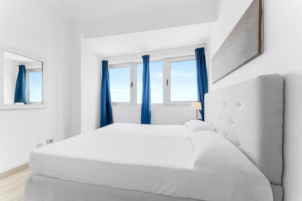Postel nebo postele na pokoji v ubytování Apartamentos Bruja